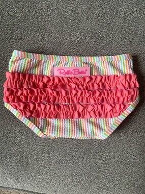 NWOT Ruffle Butts Coral Pink Ruffle Diaper Cover with Pastel Stripes